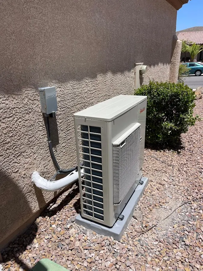 Residential air conditioning condenser unit in Clewiston